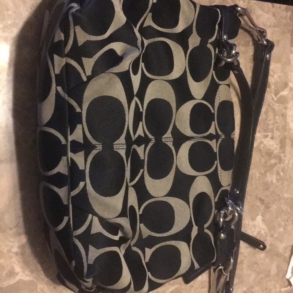 Black and Tan Coach purse